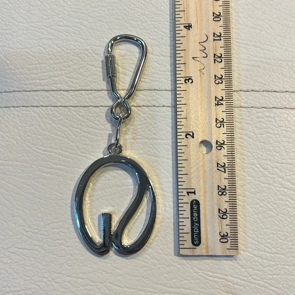 Silver-tone St. John Keychain. - Picture 2 of 2
